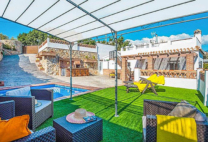 Outdoor sheltered patio . - Villa Naiara . (Photo Gallery) }}