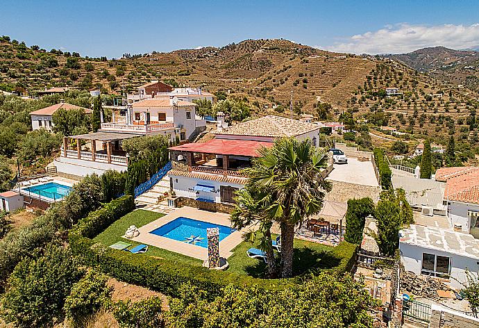 Aerial view of the  villa and pool  . - Villa Elvira . (Photo Gallery) }}