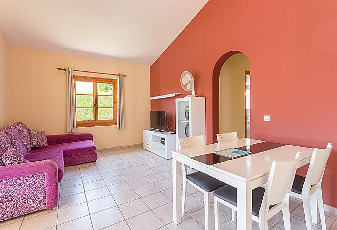 Living room with dining area, WiFi Internet, Satellite TV, and DVD player  . - Villa Noixa . (Galería de imágenes) }}