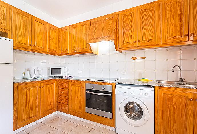 Equipped kitchen . - Villa Noixa . (Galerie de photos) }}
