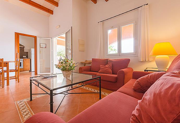 Living room with sofas, dining area, A/C, WiFi internet, satellite TV, DVD player, and terrace access . - Villa Amapola . (Fotogalerie) }}
