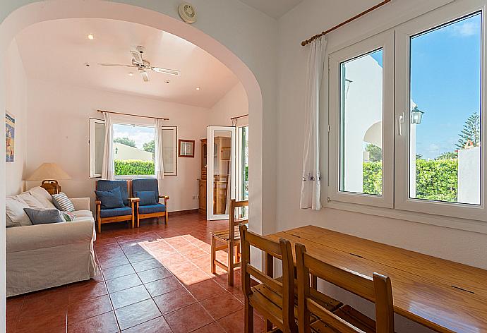 Open plan living room with dining area, kitchen, terrace access, WiFi Internet, Satellite TV, and DVD player  . - Villa Gelabert Ametller . (Galerie de photos) }}