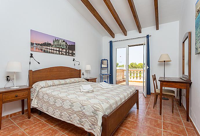 Double bedroom with balcony access . - Villa Paula . (Photo Gallery) }}