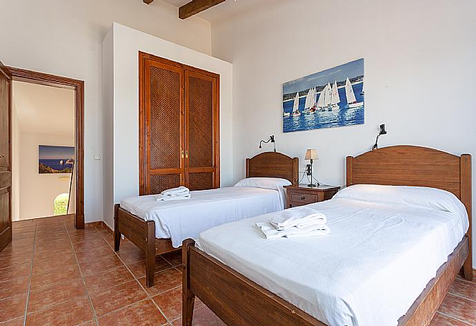 Twin bedroom with balcony access . - Villa Paula . (Photo Gallery) }}