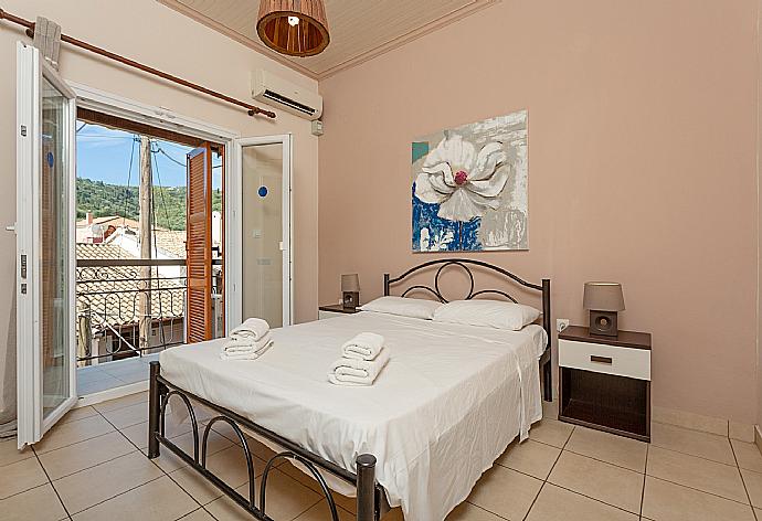 Double bedroom with A/C and balcony access . - Fay Apartment . (Photo Gallery) }}