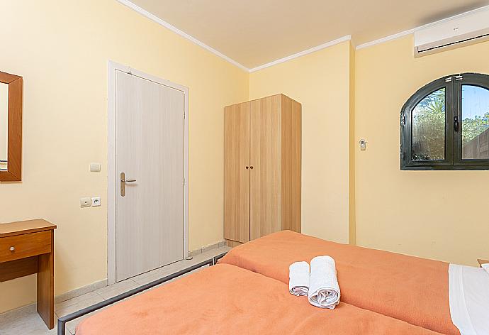 Twin bedroom with A/C, sea views, and terrace access . - Katerina . (Галерея фотографий) }}