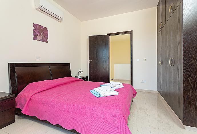 Double bedroom with en suite bathroom, A/C, and upper terrace access with sea views . - Villa Fortuna . (Photo Gallery) }}