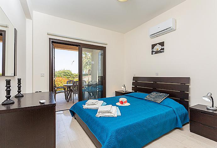 Double bedroom with en suite bathroom, A/C, and terrace access . - Villa Fortuna . (Photo Gallery) }}