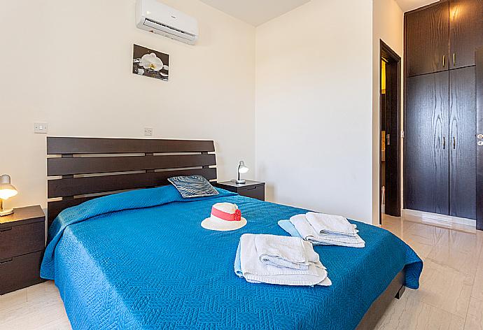 Double bedroom with en suite bathroom, A/C, and terrace access . - Villa Fortuna . (Photo Gallery) }}