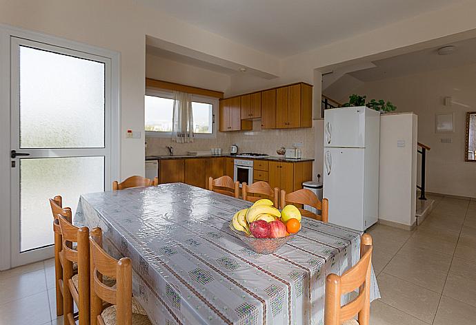 Open-plan living room with sofas, dining area, kitchen, WiFi internet, satellite TV, DVD player, and terrace access . - Villa Regina 1 . (Photo Gallery) }}