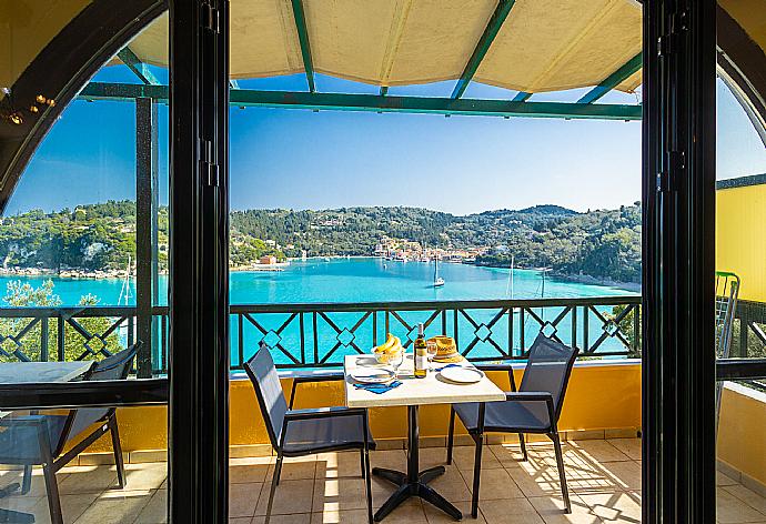 Sheltered terrace area with panoramic sea views . - Alexander . (Photo Gallery) }}