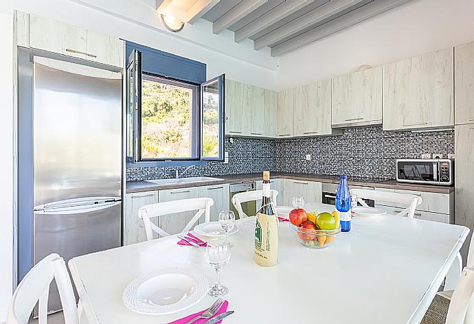 Equipped kitchen . - Villa Seashell . (Galerie de photos) }}