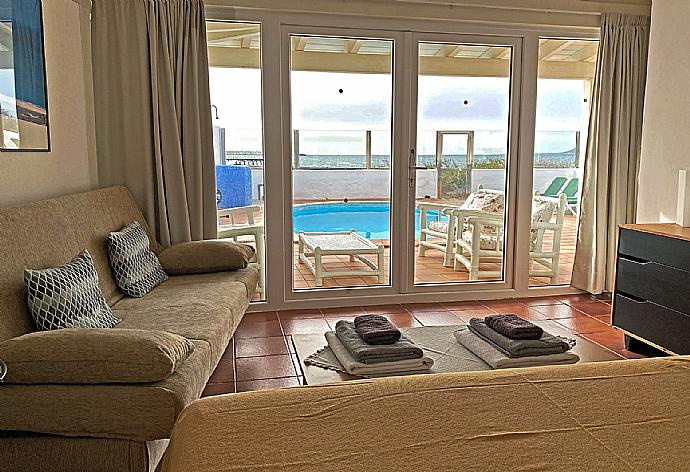 Bedroom with pool access . - Villa Remos Ocho . (Galería de imágenes) }}