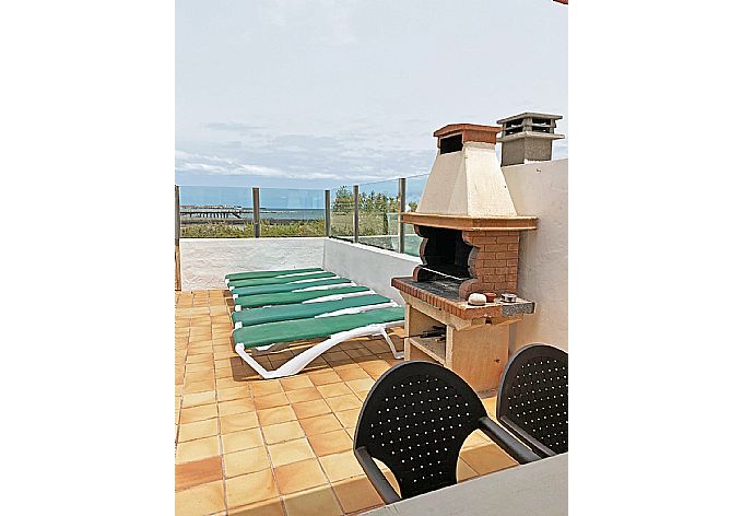 Outdoor area with BBQ  . - Villa Remos Ocho . (Photo Gallery) }}