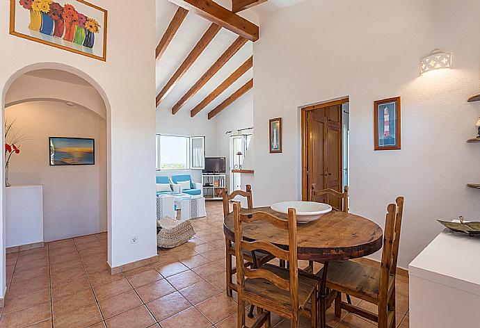 Open plan living room with dining area, WiFi Internet, Satellite TV, DVD player, and balcony access . - Casa Anna . (Galerie de photos) }}