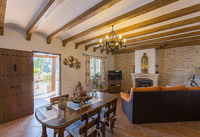 Living room with dining area. . - Villa Rosandra . (Photo Gallery) }}