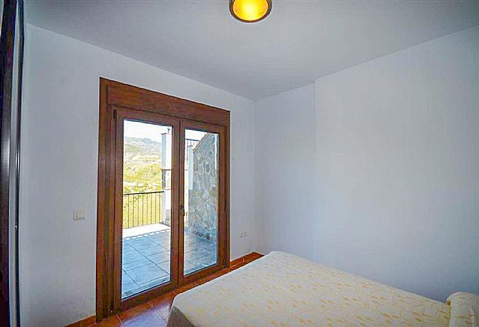 Double bedroom with A/C . - Villa Araceli . (Photo Gallery) }}