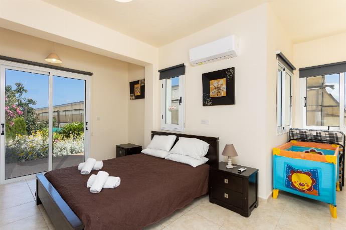 Double bedroom with A/C . - Villa Kleopatra . (Photo Gallery) }}