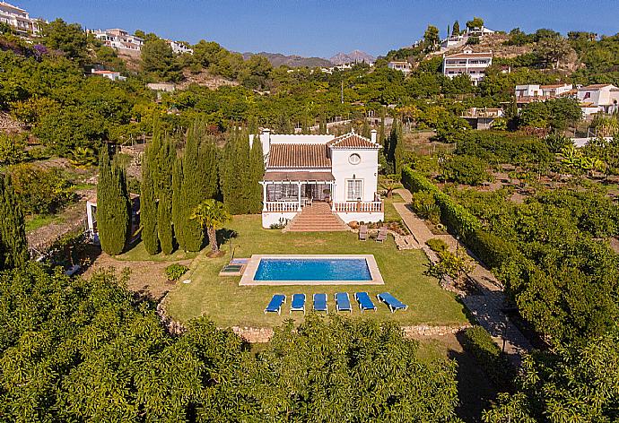 Aerial view of the villa and the pool area  . - Villa Tinajas . (Photo Gallery) }}