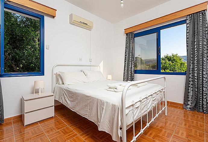 Double bedroom with A/C . - Villa Charoula Tessera . (Галерея фотографий) }}