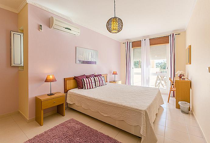Double bedroom with A/C and balcony access . - Casa da Encosta . (Photo Gallery) }}
