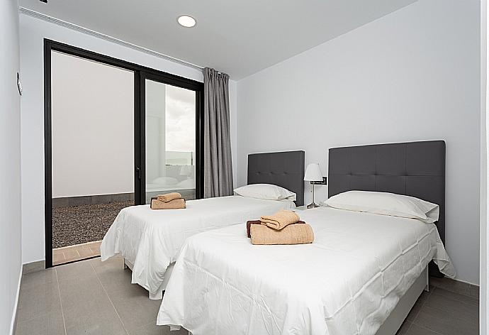 Twin bedroom with A/C and terrace access . - Villa Dream Seis . (Photo Gallery) }}