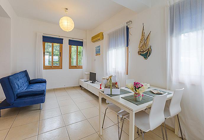 Living room with TV and indoor dining  . - Argaka Sunset Villa . (Galerie de photos) }}