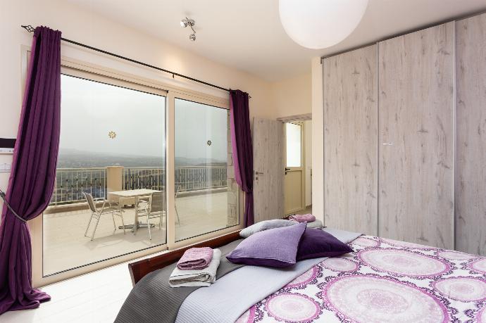 Double bedroom on first floor with en suite bathroom, A/C, views, and upper terrace access . - Villa Christel . (Галерея фотографий) }}