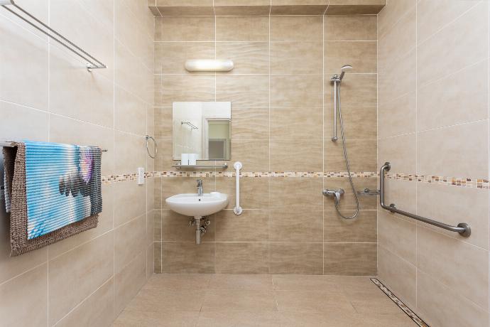 En suite bathroom on ground floor with shower . - Villa Christel . (Photo Gallery) }}