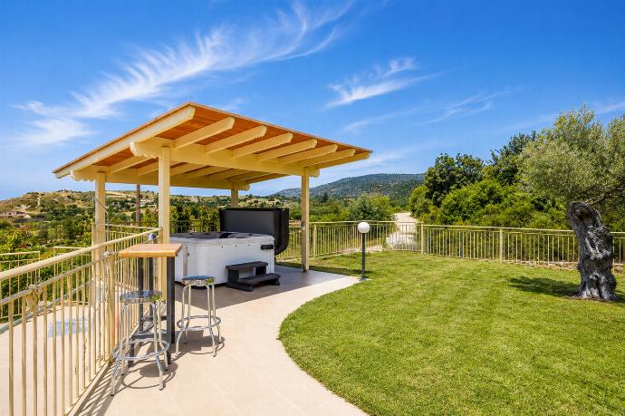 Private garden terrace with a shaded jacuzzi area and beautiful countryside views. . - Villa Christel . (Photo Gallery) }}