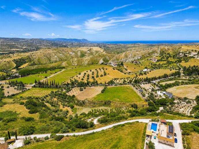 Panoramic countryside landscape with rolling hills, distant sea views, and a bright blue sky. . - Villa Christel . (Photo Gallery) }}