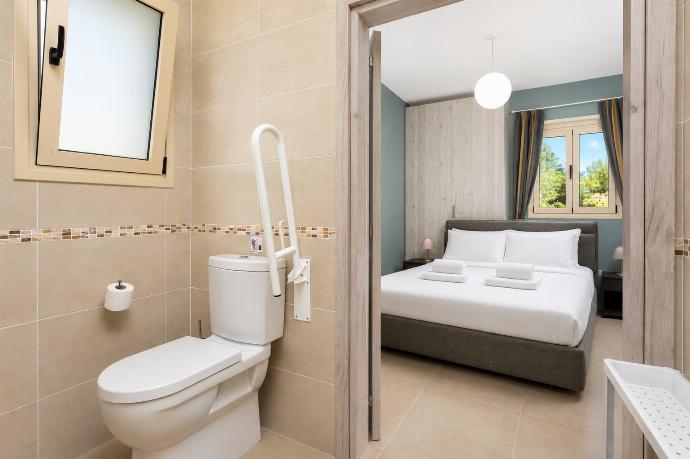 En suite bathroom on ground floor with shower . - Villa Christel . (Photo Gallery) }}