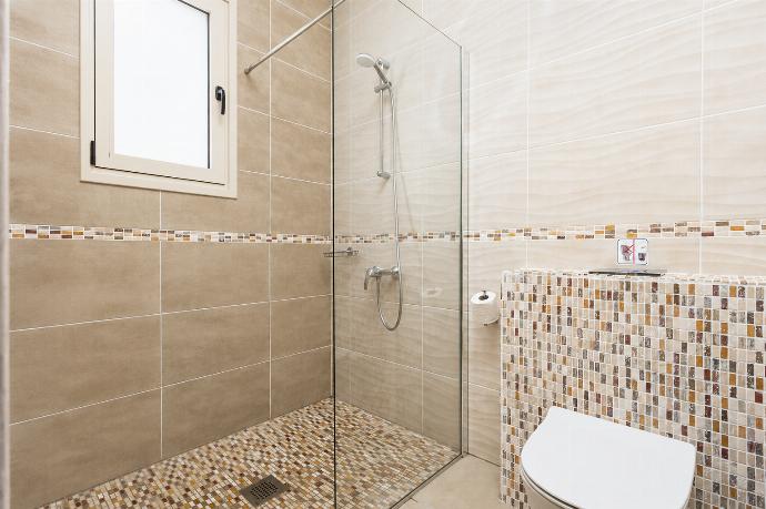 En suite bathroom with shower . - Villa Christel . (Photo Gallery) }}