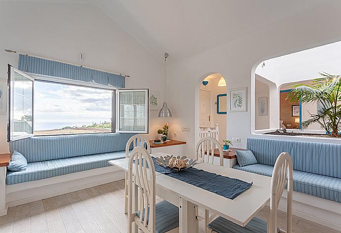 Living room with sofas, dining area, A/C, WiFi internet, and satellite TV  . - Villa Angela Vista . (Photo Gallery) }}