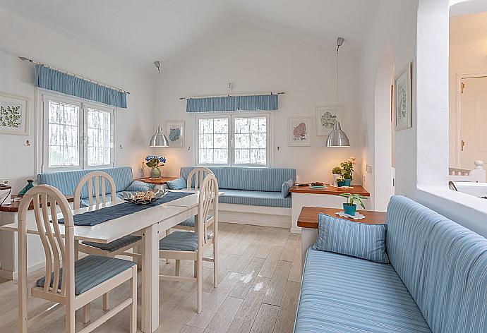 Living room with sofas, dining area, A/C, WiFi internet, and satellite TV  . - Villa Angela Vista . (Photo Gallery) }}