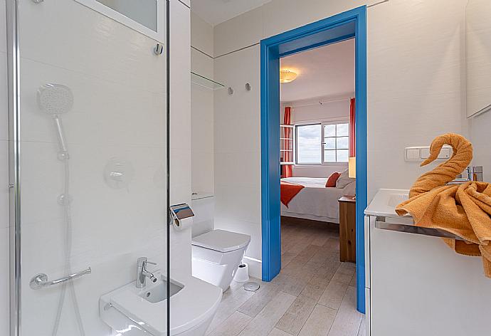 En suite bathroom with shower . - Villa Angela Vista . (Photo Gallery) }}