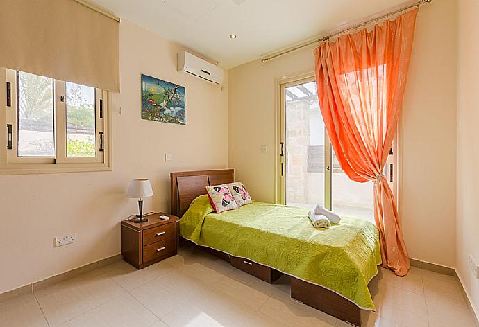 Single bedroom with A/C . - Villa Felice . (Photo Gallery) }}