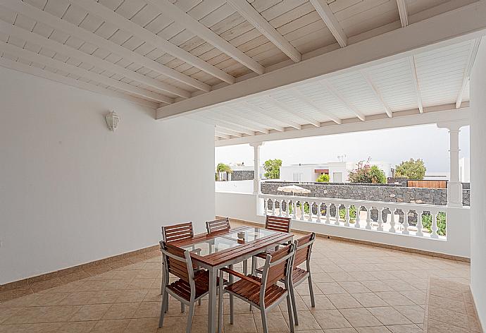 Outdoor dining area on upper terrace . - Villa Mar Azul . (Photo Gallery) }}