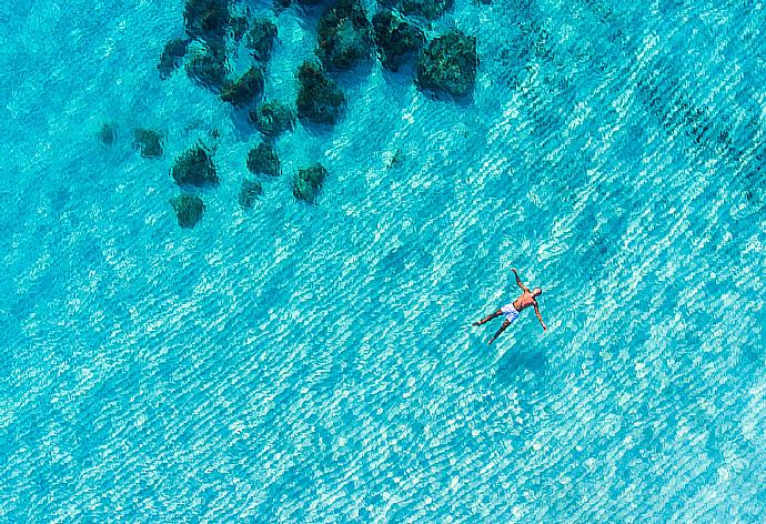 Crystal clear waters at Nissi Beach - a short drive from Villa Chryso . - Villa Chryso . (Photo Gallery) }}