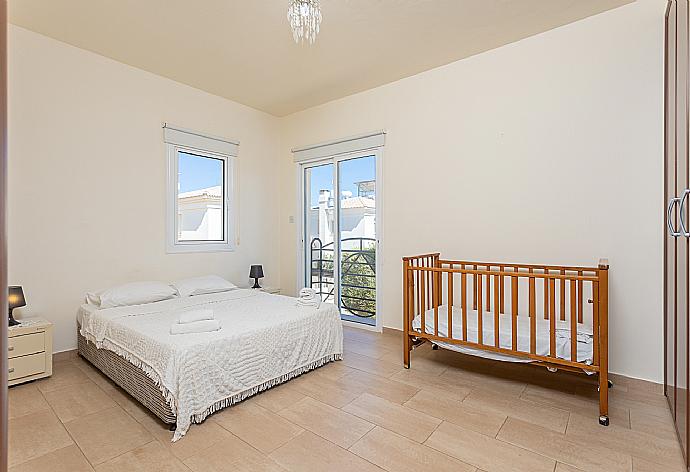 Double bedroom with en suite bathroom and A/C . - Villa Miranda . (Photo Gallery) }}