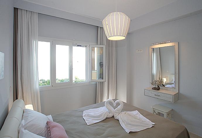 Double bedroom with A/C . - Villa Bacante . (Photo Gallery) }}