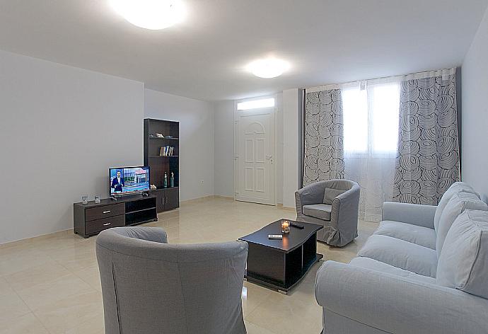 Living room with A/C, WiFi internet, and satellite TV  . - Villa Bacante . (Photo Gallery) }}