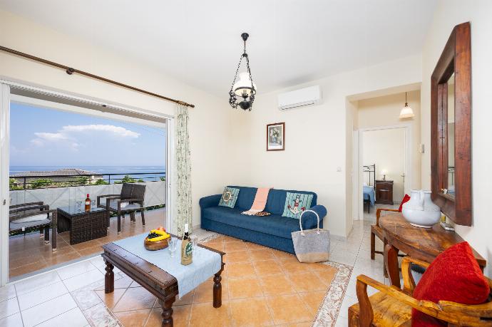 Living room with sofas, A/C, and WiFi internet . - Skala Villa Blue . (Photo Gallery) }}