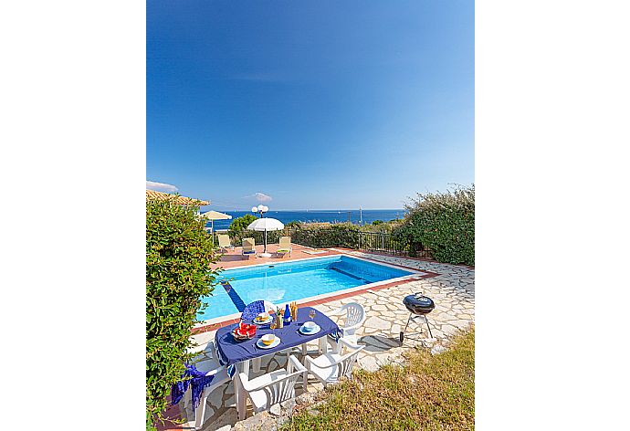 Private pool and terrace area with sea views . - Skala Villa Yellow . (Photo Gallery) }}