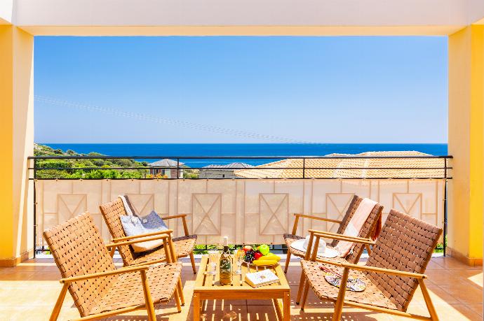 Balcony with sea views . - Skala Villa Yellow . (Photo Gallery) }}