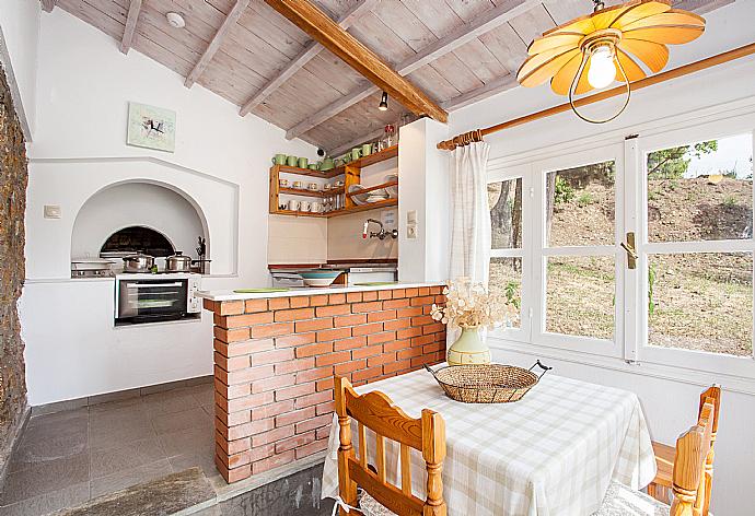 Equipped kitchen with dining area  . - Michaels Cottage . (Photo Gallery) }}