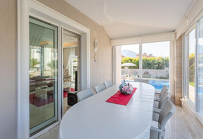 Second dining area with pool terrace access . - Villa Nirvana . (Photo Gallery) }}