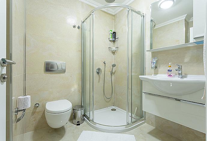 En suite bathroom with shower . - Villa Ozcelik . (Photo Gallery) }}