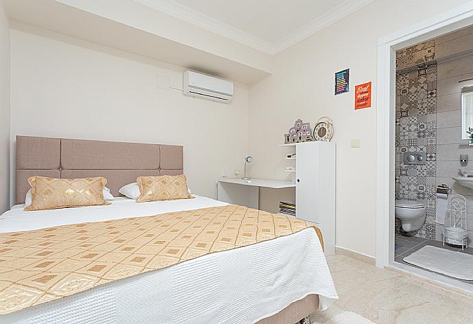 Double bedroom with en suite bathroom, A/C, and balcony access . - Villa Mina . (Photo Gallery) }}