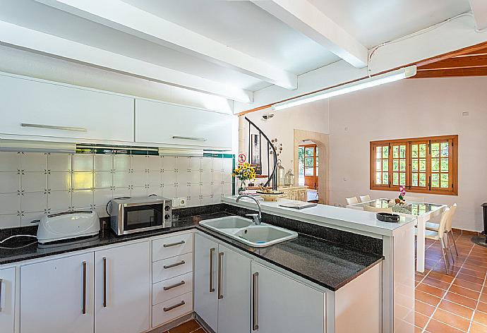 Equipped kitchen . - Can Fanals . (Photo Gallery) }}